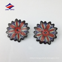 Glossy epoxy nickel plating flower shaped bdge with parts